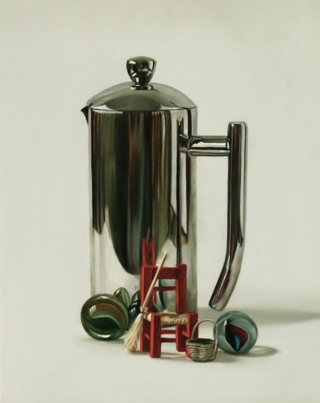 Prensa con sillita y canicas