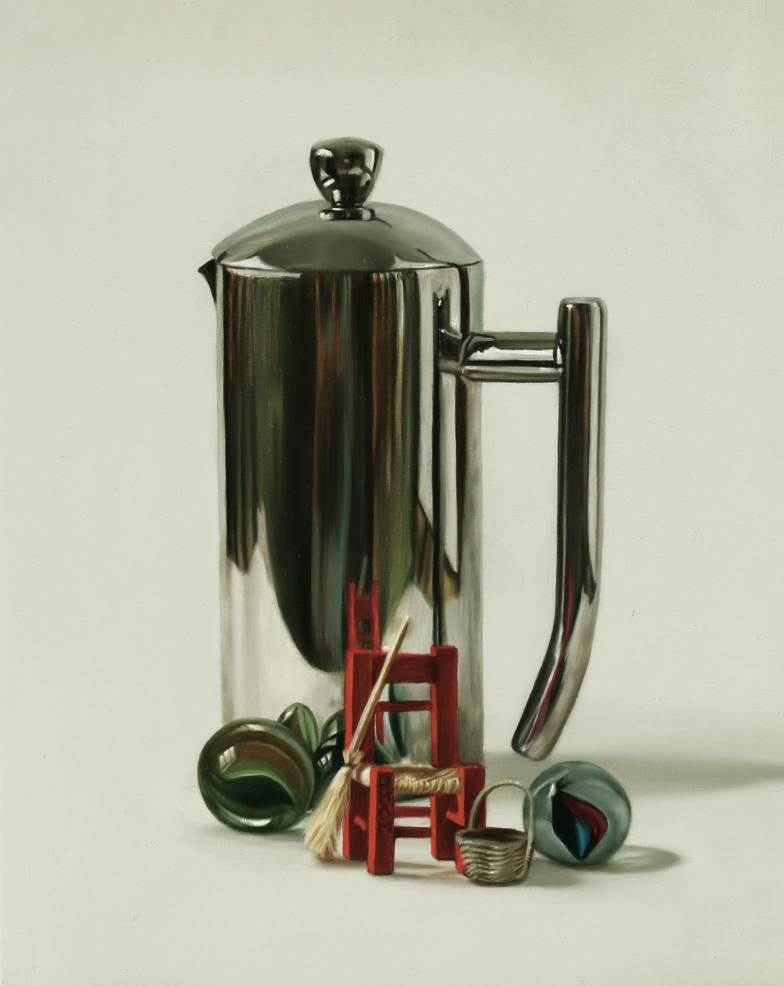 Prensa con sillita y canicas